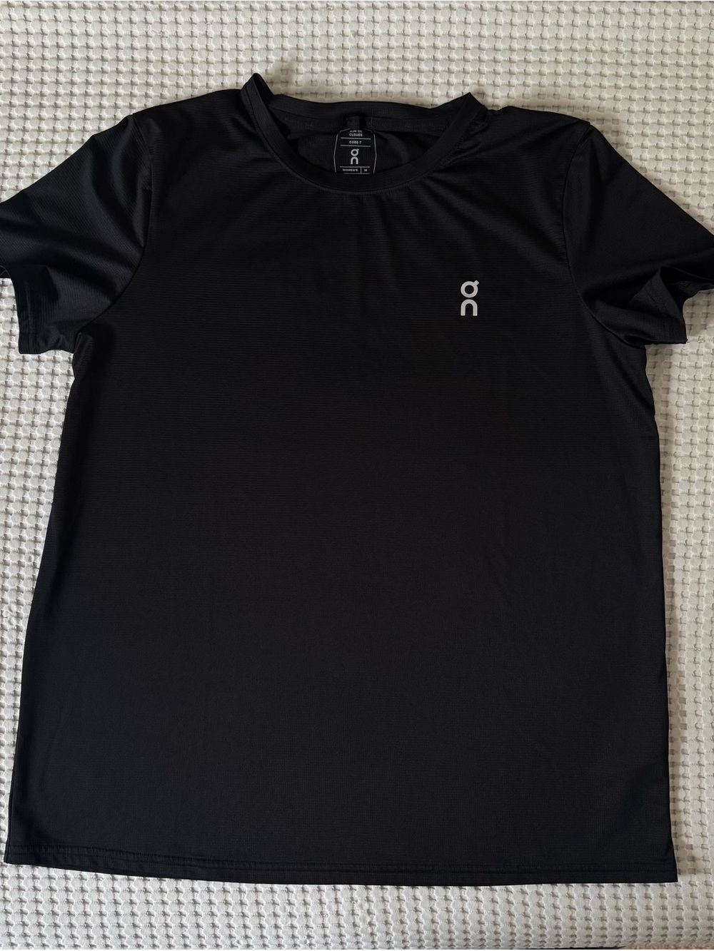 On Running women’s Black Performance Tee
